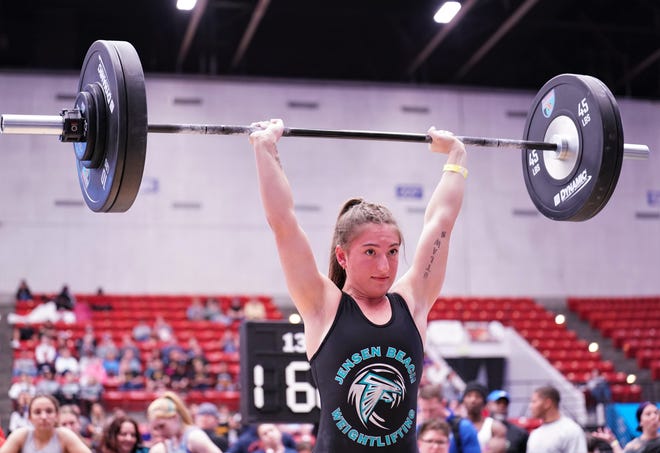 Jensen Beach's Sophia Gannascoli competes in the clean-and-jerk event as part of the Olympic lifts portion of the FHSAA Girls Weightlifting Championships that took place on Saturday, Feb. 18, 2023 at the RP Funding Center in Lakeland.