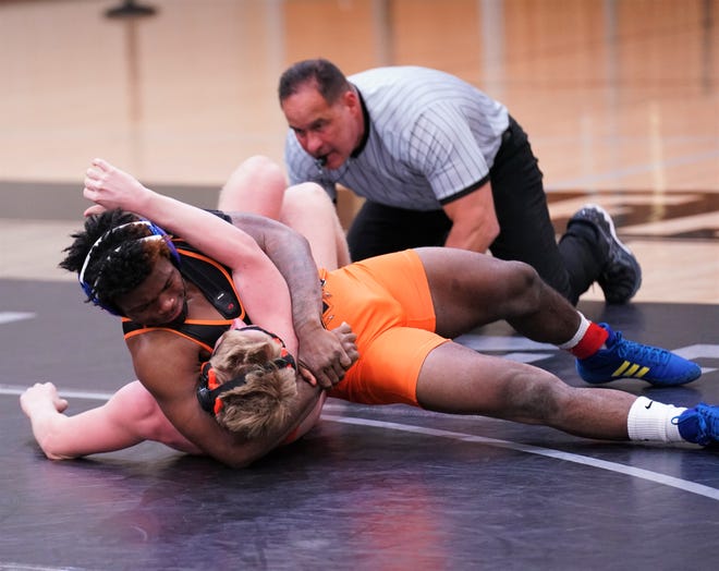 Lincoln Park Academy senior Kyle Grey wrestles Benjamin's Jacob Bounds at 170 pounds during the District 13-1A Championships on Friday, Feb. 17, 2023 in Jensen Beach. Grey won the district title to improve to 39-2 on the season.