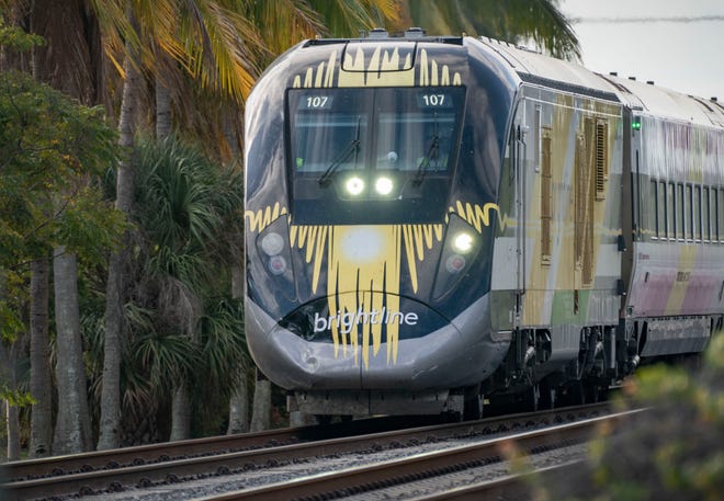 A Brightline train northbound near Northeast 13th Avenue in Boynton Beach. Brightline will link riders from Miami to Orlando in about three hours, which is 30 minutes faster than it would take driving without traffic. The West Palm to Orlando route will take around two hours.