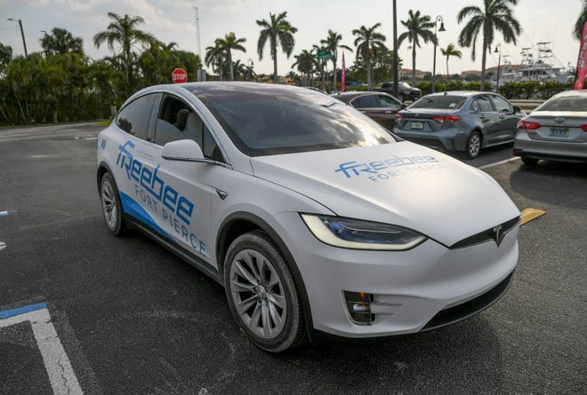 Bright white and blue logo, one of four Freebee Teslas is easily recognizable driving around Fort Pierce on Thursdays through Sundays.