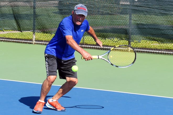 Tom Leonard chases down a ball while playing against his friend Tony Coscia on Thursday, March 17, 2022, at the Riverside Park Tennis Complex in Vero Beach. the city was approached by USTA-FL about entering into a three-year contractual agreement where the non-profit organization manages the courts, saving the city about $55,000 annually, mostly in salary costs.