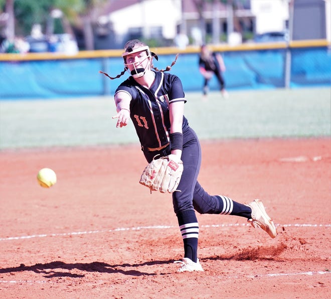 Treasure Coast's Brylea Rusler pitches during a high school softball game against John Carroll Catholic on Tuesday, March 21, 2023 in Fort Pierce. Rusler struck out 13 in a 3-1 Titan victory.