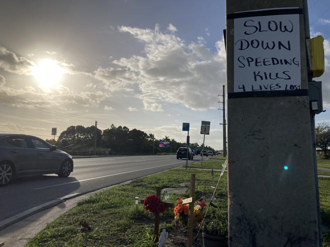 A sign photographed Dec. 2, 2022, urges motorists to slow down at Baker Road and U.S. 1. A crash at the intersection Oct. 18, 2022, left four dead.