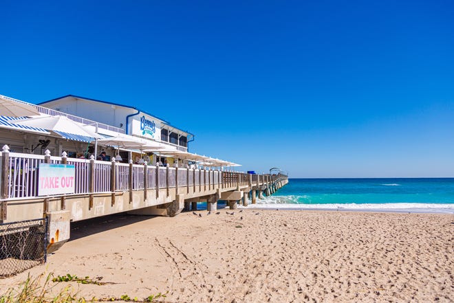 Benny's on the Beach is perched atop the Lake Worth Beach Pier, offering diners a front-row seat to the surf and sands.