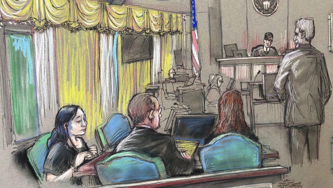 In this April 15, 2019, file court sketch, Yujing Zhang, left, a Chinese woman charged with lying to illegally enter President Donald Trump's Mar-a-Lago club, listens to a hearing before Magistrate Judge William Matthewman in West Palm Beach.