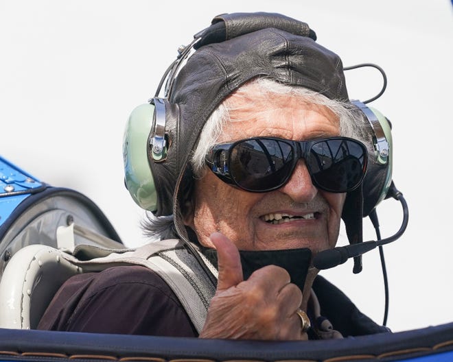 Veteran Ronald Tousignant, 89, gives a thumbs-up before heading to the sky in a 1940 Stearman biplane, Thursday, April 6, 2023, at Witham Field in Stuart. Dream Flights, a nonprofit dedicated to honoring veterans, gifted Tousignant and five other veterans a flight in the WWII-era plane.