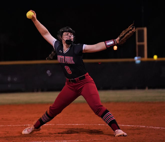 South Fork's Katie Kidwell delivers to the plate against Jensen Beach in a high school softball game on Friday, Feb. 24, 2023 in Jensen Beach. The Bulldogs won 8-5.