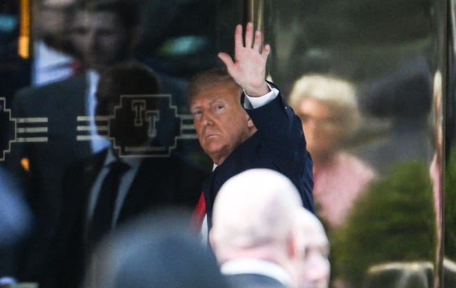Former President Donald Trump arrives at Trump Tower in New York on Monday.