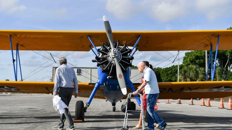 Military veterans take to skies in WWII-era biplane; ‘bucket list’ trip for one